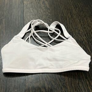 Lululemon bra size 4 pale pink EUC